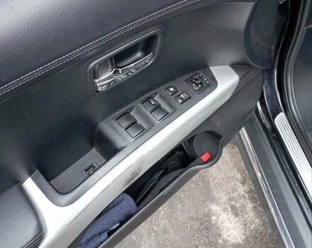 Черный Мицубиси Аутлендер, объемом двигателя 2.3 л и пробегом 255 тыс. км за 11200 $, фото 5 на Automoto.ua