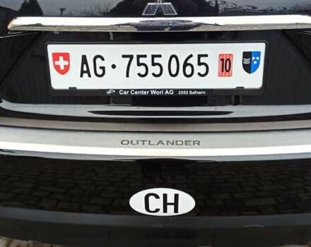 Черный Мицубиси Аутлендер, объемом двигателя 2.2 л и пробегом 209 тыс. км за 12700 $, фото 38 на Automoto.ua