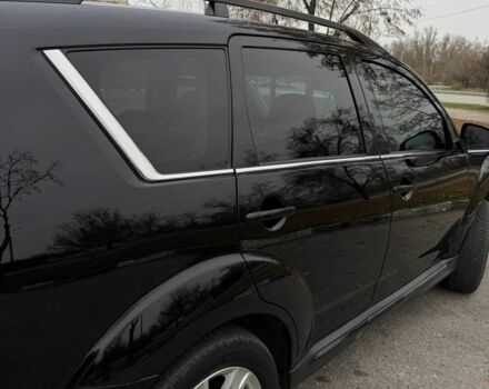 Черный Мицубиси Аутлендер, объемом двигателя 2.2 л и пробегом 253 тыс. км за 12500 $, фото 2 на Automoto.ua