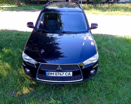 Черный Мицубиси Аутлендер, объемом двигателя 2.2 л и пробегом 190 тыс. км за 11999 $, фото 7 на Automoto.ua