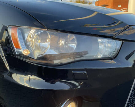 Чорний Міцубісі Аутлендер, об'ємом двигуна 2.4 л та пробігом 93 тис. км за 12500 $, фото 7 на Automoto.ua