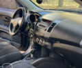 Міцубісі Аутлендер 2011 у Хмельницькому на Automoto.ua Чорний Міцубісі Аутлендер, об'ємом двигуна 2 л та пробігом 196 тис. км за 9500 $, фото 16 на Automoto.ua