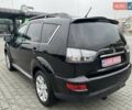 Черный Мицубиси Аутлендер, объемом двигателя 2.2 л и пробегом 226 тыс. км за 10750 $, фото 17 на Automoto.ua
