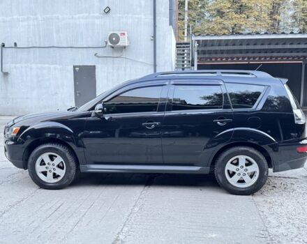 Черный Мицубиси Аутлендер, объемом двигателя 2 л и пробегом 150 тыс. км за 10200 $, фото 6 на Automoto.ua