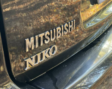 Міцубісі Аутлендер 2011 у Хмельницькому на Automoto.ua Чорний Міцубісі Аутлендер, об'ємом двигуна 2 л та пробігом 196 тис. км за 9500 $, фото 4 на Automoto.ua
