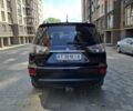 Черный Мицубиси Аутлендер, объемом двигателя 2.27 л и пробегом 188 тыс. км за 11700 $, фото 3 на Automoto.ua