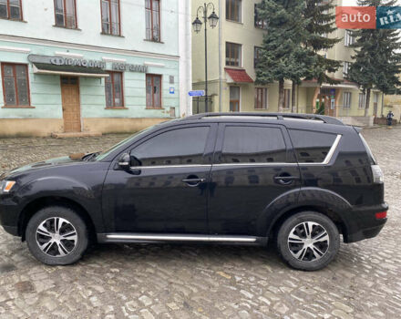 Черный Мицубиси Аутлендер, объемом двигателя 2.27 л и пробегом 233 тыс. км за 10500 $, фото 4 на Automoto.ua