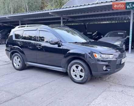 Черный Мицубиси Аутлендер, объемом двигателя 2 л и пробегом 150 тыс. км за 10200 $, фото 5 на Automoto.ua