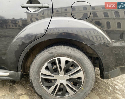 Черный Мицубиси Аутлендер, объемом двигателя 2.27 л и пробегом 233 тыс. км за 10500 $, фото 13 на Automoto.ua