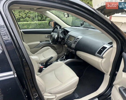 Чорний Міцубісі Аутлендер, об'ємом двигуна 2.2 л та пробігом 216 тис. км за 12000 $, фото 14 на Automoto.ua