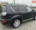 Черный Мицубиси Аутлендер, объемом двигателя 2.2 л и пробегом 226 тыс. км за 10750 $, фото 24 на Automoto.ua