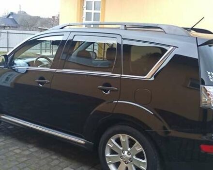 Черный Мицубиси Аутлендер, объемом двигателя 2.2 л и пробегом 209 тыс. км за 12700 $, фото 13 на Automoto.ua