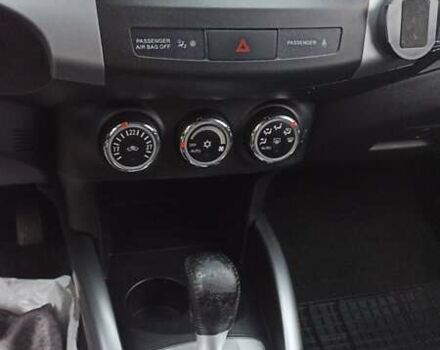 Черный Мицубиси Аутлендер, объемом двигателя 2 л и пробегом 196 тыс. км за 9900 $, фото 17 на Automoto.ua