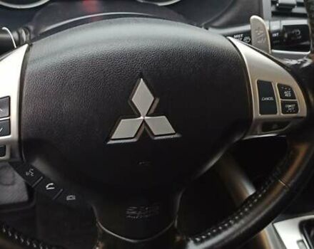 Черный Мицубиси Аутлендер, объемом двигателя 2.2 л и пробегом 209 тыс. км за 12700 $, фото 24 на Automoto.ua