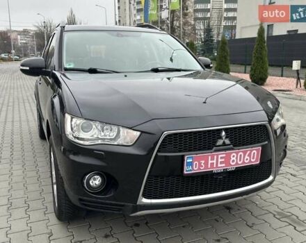 Черный Мицубиси Аутлендер, объемом двигателя 2.2 л и пробегом 226 тыс. км за 10750 $, фото 2 на Automoto.ua