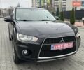 Черный Мицубиси Аутлендер, объемом двигателя 2.2 л и пробегом 226 тыс. км за 10750 $, фото 2 на Automoto.ua