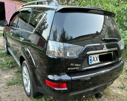 Черный Мицубиси Аутлендер, объемом двигателя 2.4 л и пробегом 220 тыс. км за 10500 $, фото 3 на Automoto.ua