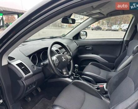 Черный Мицубиси Аутлендер, объемом двигателя 2.2 л и пробегом 226 тыс. км за 10750 $, фото 8 на Automoto.ua