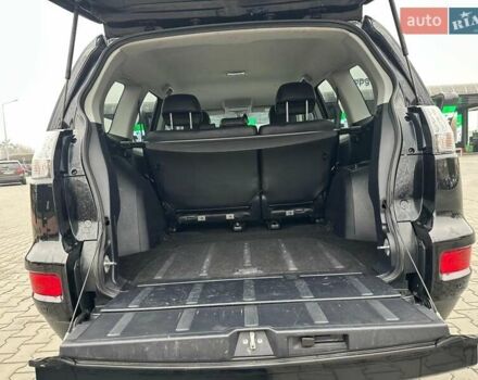 Черный Мицубиси Аутлендер, объемом двигателя 2.2 л и пробегом 226 тыс. км за 10750 $, фото 37 на Automoto.ua