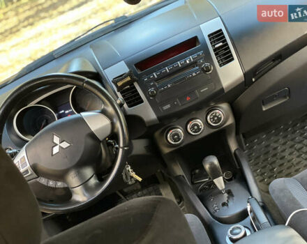 Міцубісі Аутлендер 2011 у Хмельницькому на Automoto.ua Чорний Міцубісі Аутлендер, об'ємом двигуна 2 л та пробігом 196 тис. км за 9500 $, фото 17 на Automoto.ua