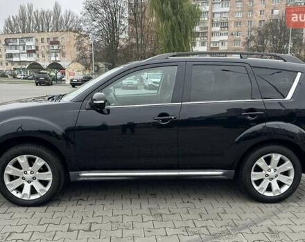 Черный Мицубиси Аутлендер, объемом двигателя 2.2 л и пробегом 226 тыс. км за 10750 $, фото 7 на Automoto.ua