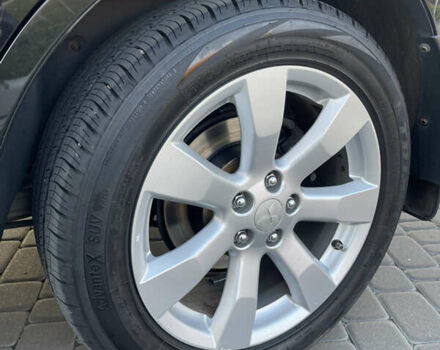 Чорний Міцубісі Аутлендер, об'ємом двигуна 2.4 л та пробігом 93 тис. км за 12500 $, фото 11 на Automoto.ua