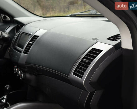 Міцубісі Аутлендер 2011 у Бердичеве на Automoto.ua Чорний Міцубісі Аутлендер, об'ємом двигуна 2.2 л та пробігом 237 тис. км за 11499 $, фото 52 на Automoto.ua