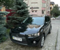 Міцубісі Аутлендер 2011 у Львові на Automoto.ua Чорний Міцубісі Аутлендер, об'ємом двигуна 2.36 л та пробігом 172 тис. км за 11000 $, фото 3 на Automoto.ua