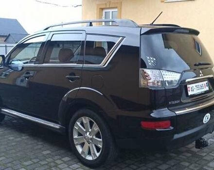 Черный Мицубиси Аутлендер, объемом двигателя 2.2 л и пробегом 209 тыс. км за 12700 $, фото 16 на Automoto.ua