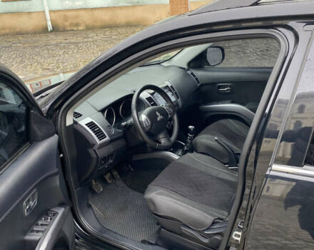 Черный Мицубиси Аутлендер, объемом двигателя 2.27 л и пробегом 233 тыс. км за 10500 $, фото 9 на Automoto.ua