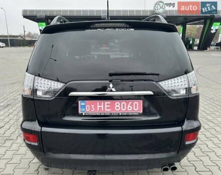 Черный Мицубиси Аутлендер, объемом двигателя 2.2 л и пробегом 226 тыс. км за 10750 $, фото 19 на Automoto.ua