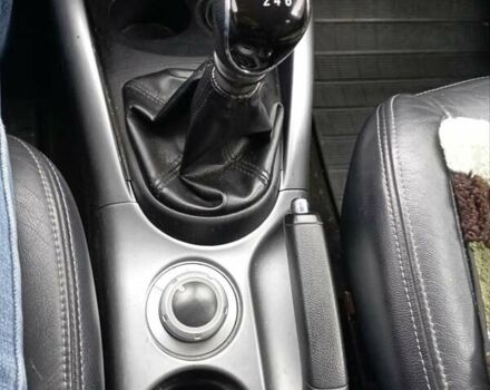 Черный Мицубиси Аутлендер, объемом двигателя 2.3 л и пробегом 255 тыс. км за 11200 $, фото 1 на Automoto.ua