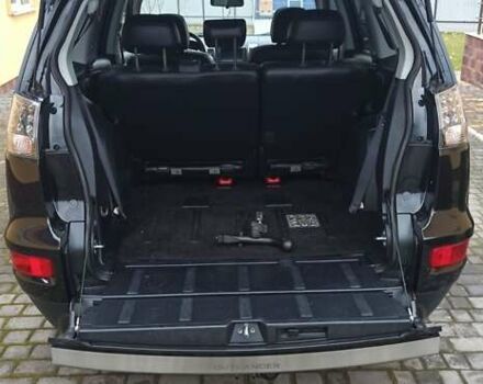 Черный Мицубиси Аутлендер, объемом двигателя 2.2 л и пробегом 209 тыс. км за 12700 $, фото 39 на Automoto.ua