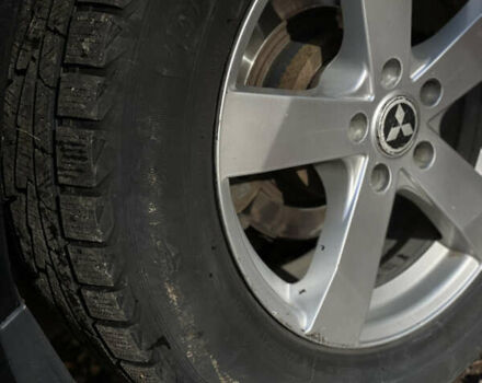 Міцубісі Аутлендер 2011 у Хмельницькому на Automoto.ua Чорний Міцубісі Аутлендер, об'ємом двигуна 2 л та пробігом 196 тис. км за 9500 $, фото 13 на Automoto.ua