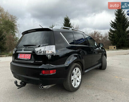 Чорний Міцубісі Аутлендер, об'ємом двигуна 2.2 л та пробігом 236 тис. км за 11399 $, фото 5 на Automoto.ua