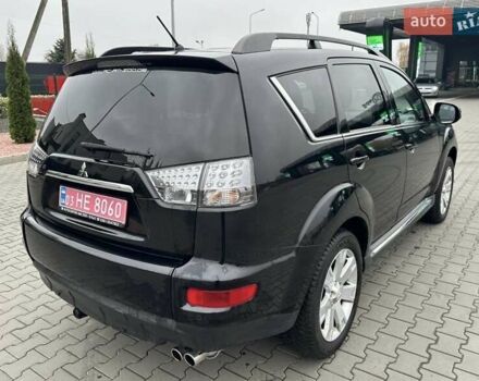 Черный Мицубиси Аутлендер, объемом двигателя 2.2 л и пробегом 226 тыс. км за 10750 $, фото 23 на Automoto.ua