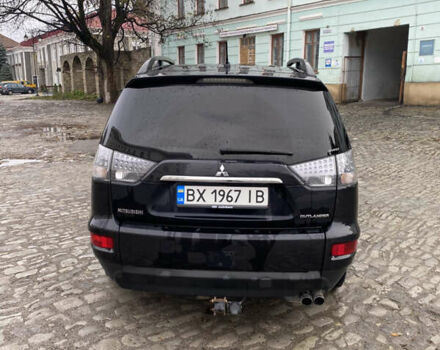Черный Мицубиси Аутлендер, объемом двигателя 2.27 л и пробегом 233 тыс. км за 10500 $, фото 7 на Automoto.ua