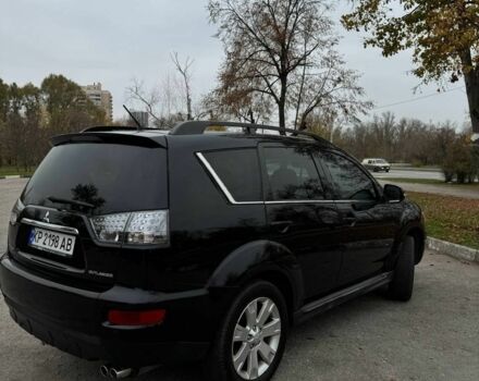 Черный Мицубиси Аутлендер, объемом двигателя 2.2 л и пробегом 253 тыс. км за 12500 $, фото 4 на Automoto.ua