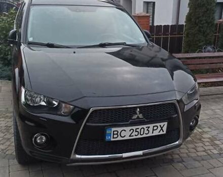 Черный Мицубиси Аутлендер, объемом двигателя 2 л и пробегом 196 тыс. км за 9900 $, фото 9 на Automoto.ua