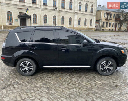 Черный Мицубиси Аутлендер, объемом двигателя 2.27 л и пробегом 233 тыс. км за 10500 $, фото 5 на Automoto.ua