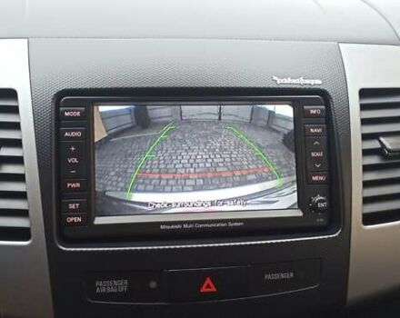 Черный Мицубиси Аутлендер, объемом двигателя 2.2 л и пробегом 209 тыс. км за 12700 $, фото 26 на Automoto.ua