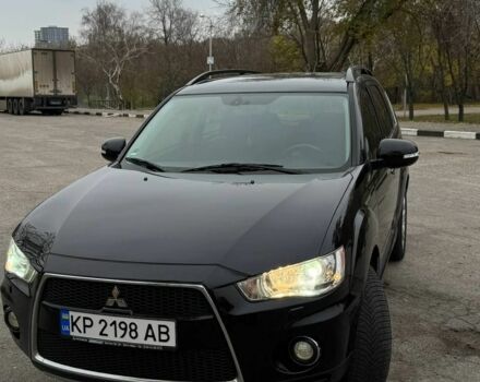 Черный Мицубиси Аутлендер, объемом двигателя 2.2 л и пробегом 253 тыс. км за 12500 $, фото 1 на Automoto.ua