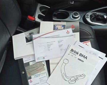 Черный Мицубиси Аутлендер, объемом двигателя 2.2 л и пробегом 209 тыс. км за 12700 $, фото 51 на Automoto.ua