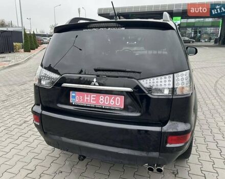 Черный Мицубиси Аутлендер, объемом двигателя 2.2 л и пробегом 226 тыс. км за 10750 $, фото 22 на Automoto.ua
