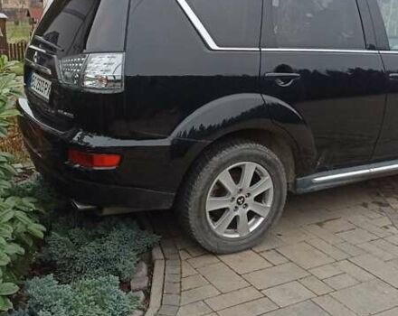 Черный Мицубиси Аутлендер, объемом двигателя 2 л и пробегом 196 тыс. км за 9900 $, фото 22 на Automoto.ua