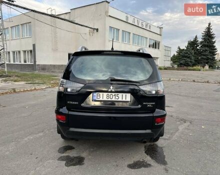 Чорний Міцубісі Аутлендер, об'ємом двигуна 2.4 л та пробігом 177 тис. км за 11900 $, фото 8 на Automoto.ua