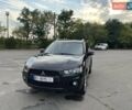 Чорний Міцубісі Аутлендер, об'ємом двигуна 2.4 л та пробігом 177 тис. км за 11900 $, фото 10 на Automoto.ua