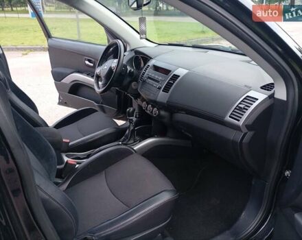 Чорний Міцубісі Аутлендер, об'ємом двигуна 2.2 л та пробігом 238 тис. км за 10100 $, фото 9 на Automoto.ua