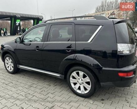 Черный Мицубиси Аутлендер, объемом двигателя 2.2 л и пробегом 226 тыс. км за 10750 $, фото 14 на Automoto.ua