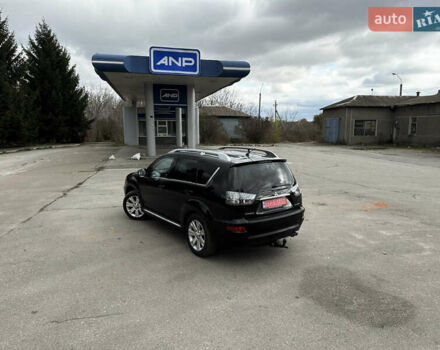 Чорний Міцубісі Аутлендер, об'ємом двигуна 2.2 л та пробігом 236 тис. км за 11399 $, фото 20 на Automoto.ua